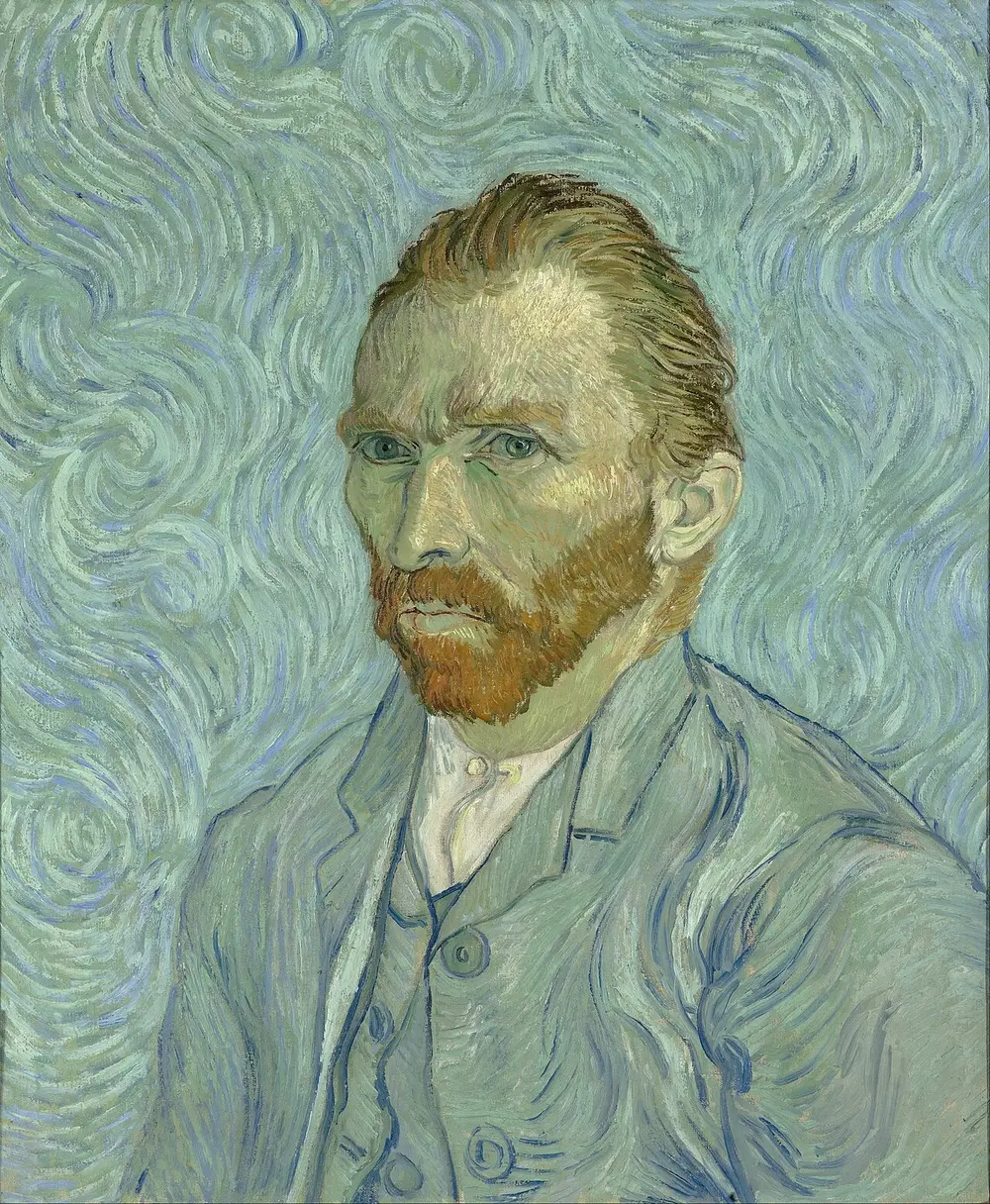 Van Gogh paints himself with red-orange hair and beard and a blue-grey suit, staring sideways, against a pale blue background full of swirling lines.