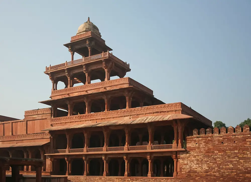 The Panch Mahal, a red sandstone pavilion of open columned floors that get smaller as they rise, topped by a small domed kiosk.