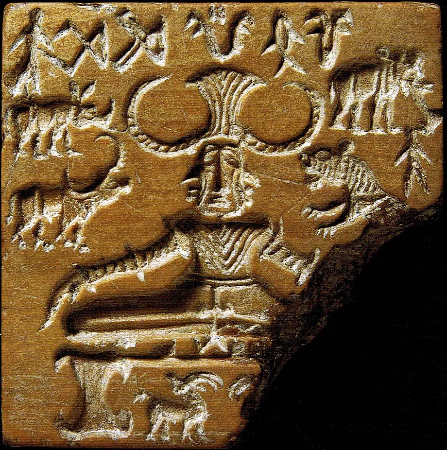A carved square seal showing a seated figure with a large horned headdress and folded legs, surrounded by an elephant, a tiger, a rhinoceros, a buffalo and two small animals below the seat.