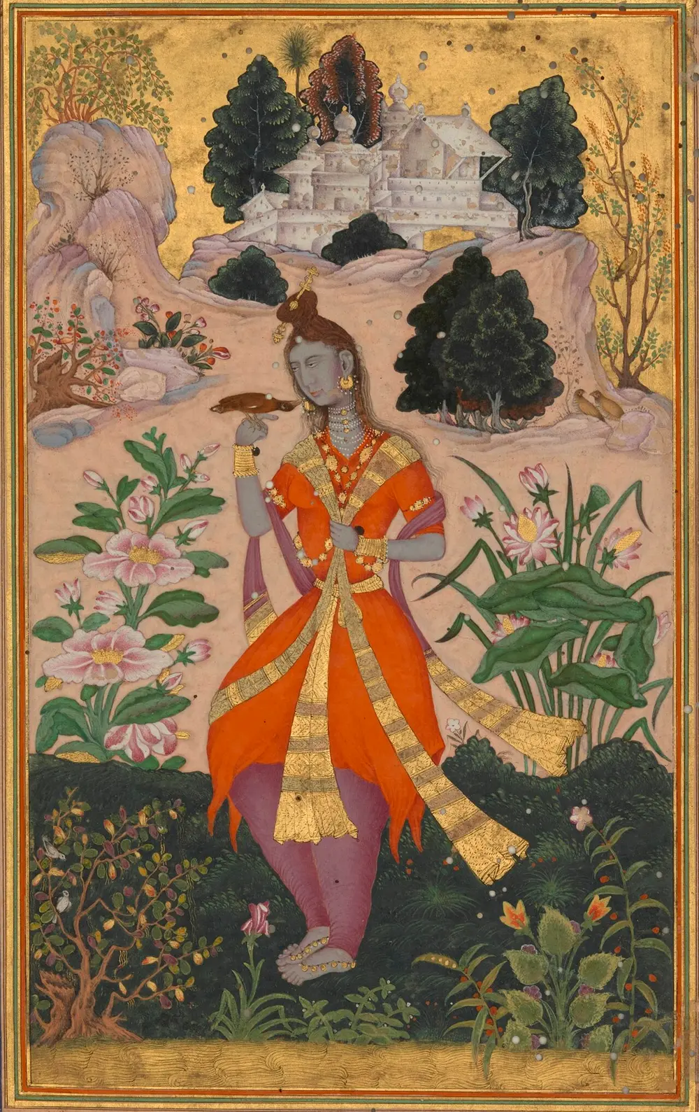 A tall, slender yogini in orange robes stands in a garden of large flowers with a small bird perched on her hand, and a white palace on the hills behind her.