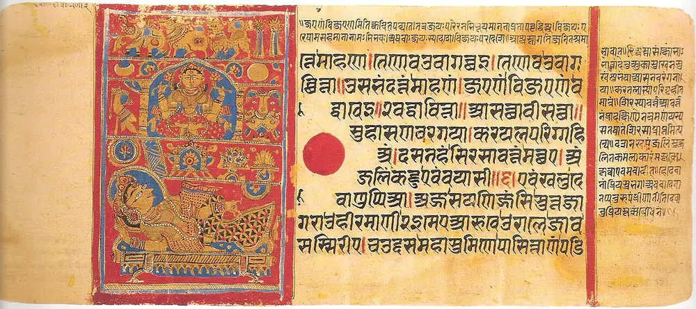 A long manuscript page with lines of script on the right and, on the left, a painted panel on a red background showing Queen Trishala lying on a bed below pictures from her dreams.