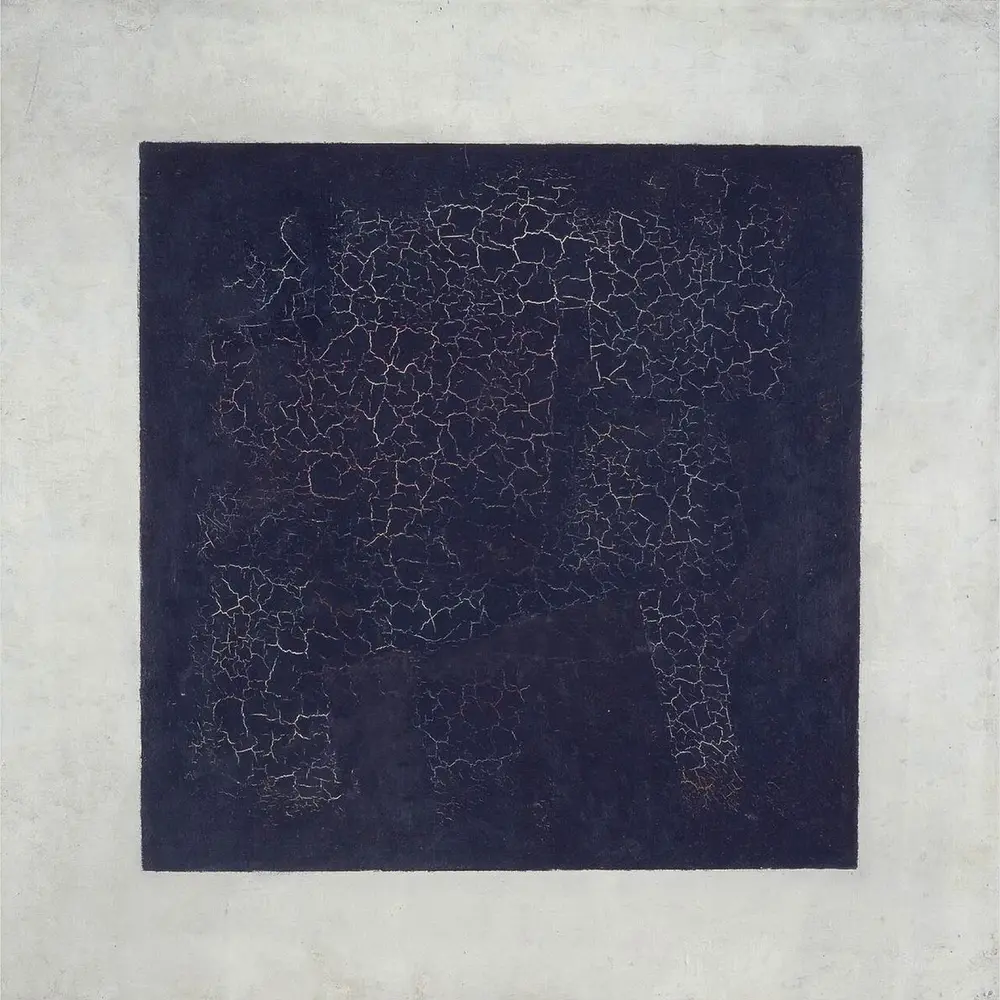 A black square, its paint covered in fine cracks, on a white background.
