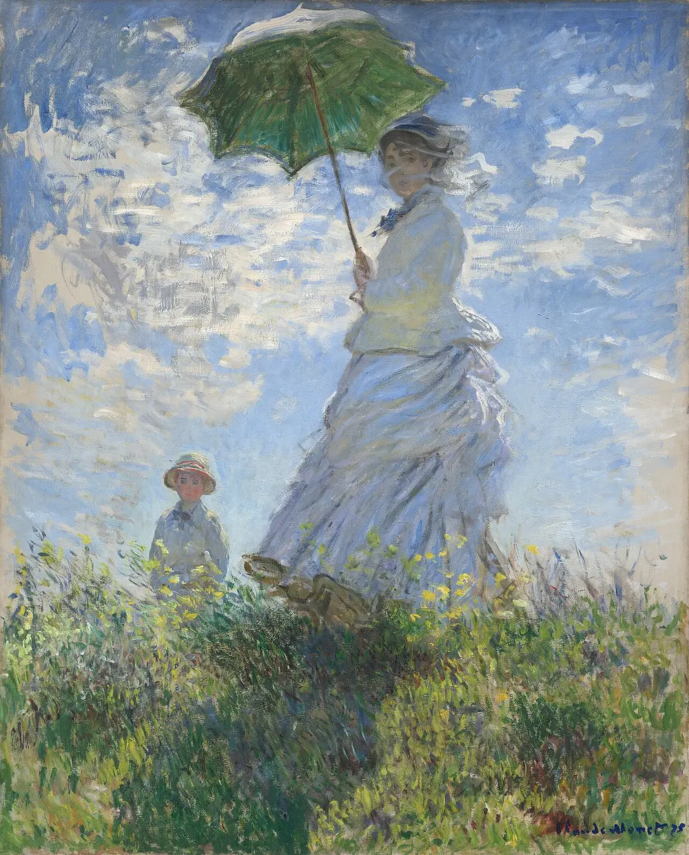 Seen from below, a woman in a white dress holding a green parasol stands on a grassy hill against a bright blue sky with white clouds, her veil blowing in the wind, while a small boy stands behind her in the grass.