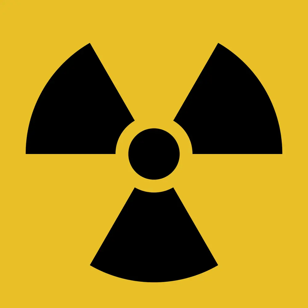A black three-bladed fan shape around a small black circle, on a yellow square.
