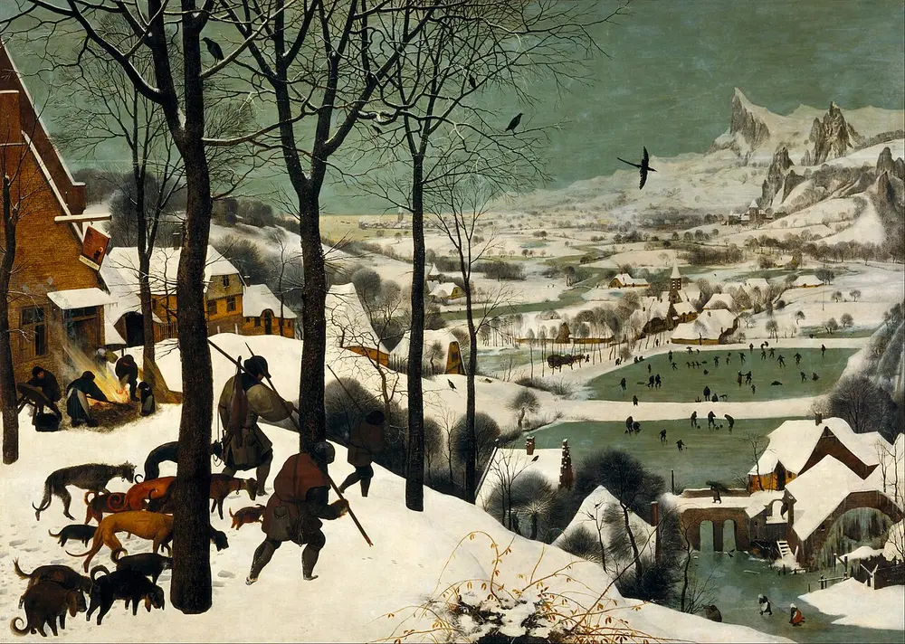 A winter scene of hunters and dogs trudging over a snowy hill past bare trees, looking down on a valley with frozen ponds full of skaters and jagged mountains beyond.