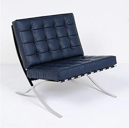 Who is the designer of the chair shown below?